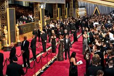 the oscars red carpet is crowded with people