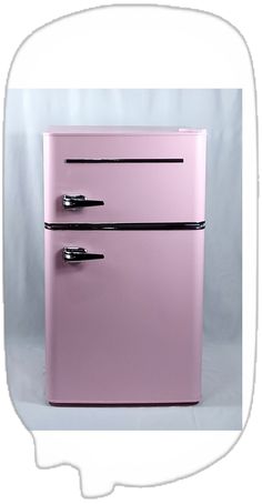 a pink refrigerator freezer sitting on top of a white counter