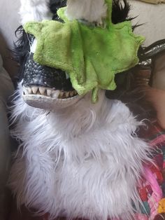 dino mask commissions (0/2 slots taken) message me before buying base prices (1-5 paint colors/1-2 fur colors, anymore will result in a price raise that will have a custom listing made) painted mask - $65 painted + ears - $100 painted + ears + hood - $130 painted + ears + hood + nub tail - $150 all masks come with a balaclava and freebies will be completed anywhere from a few days to a month, please be aware it will take a few days to start as things need to arrive I only ship to US, if outside of the US and you buy, you will be refunded. please be aware I am a minor, shop is owned by an adult but products are made by a minor I do live in a house with dogs and cat  all suits will be brushed and sprayed before shipped but if you have any problems with any of those, do not buy from me, put a Dog Dino Mask, Dino Mask Paint Ideas, Painted Mask, Dino Mask, Suit Ideas, Adult Costumes, A House, A Month, Paint Colors