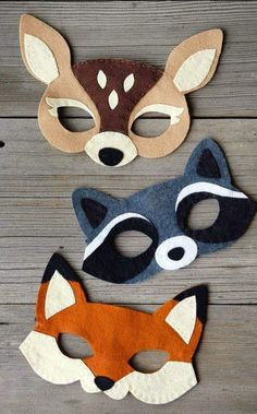 two masks made to look like foxes