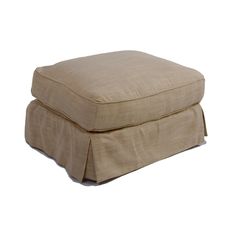 a beige ottoman with pleated edges on an isolated white background