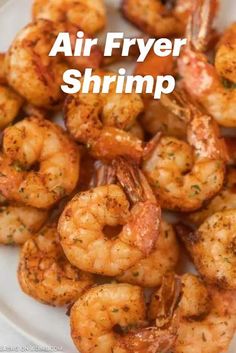 grilled shrimp is served on a white plate