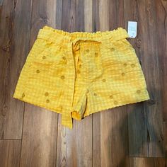 Yellow Gingham Embroidered Shorts. Floral Embroidery. Elastic Tie Waist. Pockets! Brand New With Tags. Size Medium. Waist Unstretched Measures About 15” Unstretched, Rise 12.75”, Inseam 2.75” Summer Cotton Shorts With Floral Embroidery, Floral Embroidered Cotton Summer Shorts, Embroidered Yellow Cotton Bottoms, Yellow Embroidered Cotton Bottoms, Yellow Embroidered Summer Bottoms, Yellow Bottoms With Floral Embroidery For Summer, Yellow Embroidered Bottoms For Summer, Yellow Floral Embroidered Bottoms For Summer, Spring Yellow Bottoms With Floral Embroidery