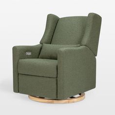 The Babyletto Kiwi Swivel Recliner provides nurseries with sleek style, comfort and even some peace and quiet. The chair swivels 270-degrees, glides back and forth, and electronically reclines with a push of a button, so you won't disrupt your little one's sleep while you get comfortable. There's even a USB port so you can keep your phone charged up and conveniently on hand. The chair is upholstered by hand in an ultra-soft and cozy, texture-rich boucle fabric that's perfect for snuggle sessions Olive Green Nursery, Green Recliner, Babyletto Kiwi, Glider Nursery, Nursery Rocking Chair Glider, Green Nursery Boy, Nursery Recliner, Nursery Glider, Rocking Chair Nursery