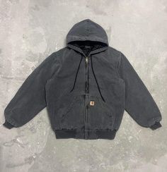 Carhartt J130 Jacket WIP BLK Thank you so much for checking out our store, we have recently started and would love to provide everyone with the best experience possible. Please shoot us a message for any questions and inquries. Best Wishes, VintageMarinadeNZ Jackets Zip Up, Carharrt Jacket Fit, Grey Carhartt Jacket, Patchwork Carhartt Jacket, Carhartt Workwear Jacket, Carhartt Jacket Black, Carhartt Winter Jacket, Carhartt Zip Up Hoodie Outfit, Carhartt Zip Up