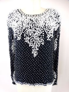 "A beautiful vintage piece embellished with pearls, sequins and glass beading. It's in good vintage condition! Measurements: Bust - 32-36\" Shoulders - 15\" (hem to hem) Sleeves - 23\" Top to Bottom - 22\" Tag Size - Small All of my items come from a smoke-free and pet-free home. If you have any questions, please don't hesitate to ask!" Checkered Jacket, Beaded Blouse, Bead Sewing, Gown Photos, Blouse Long Sleeve, Sequin Jacket, Vintage Couture, Beaded Gown, Vintage Blouse