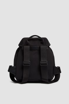 a black backpack with two straps on the front and one strap down to the back