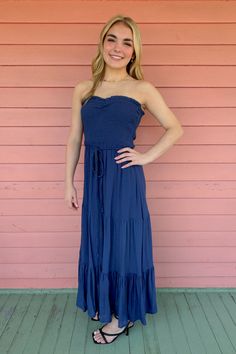 Get ready to be swept away in style with our Windswept Strapless Smocked Maxi Dress. This rayon beauty features a smocked design for a perfect, comfortable fit. So hit the beach, the boardwalk, or wherever the wind takes you in this effortlessly chic and playful dress.  #shoponline #onlineboutique #navymaxidress Smocked Maxi Dress, Maxi Dress Navy, The Wind