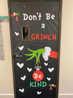 a door with the words don't be a grin on it