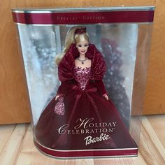 the barbie holiday celebration barbie doll is in its box