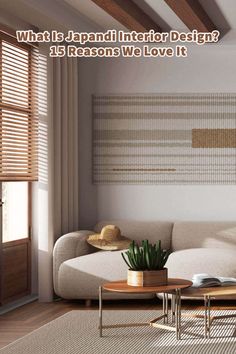 a living room with a white couch and coffee table in front of a wall hanging