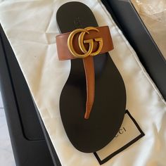 Never Used Beautiful Sandals Size 34 Chic Gucci Flat Sandals, Gucci Summer Calf Leather Sandals, Chic Gucci Sandals With Single Toe Strap, Gucci Designer Sandals With Single Toe Strap, Designer Gucci Sandals With Single Toe Strap, Gucci Calf Leather Sandals For Summer, Gucci Flat Sandals With Leather Sole, Gucci Leather Flat Sandals, Gucci Leather Sandals Flat Heel