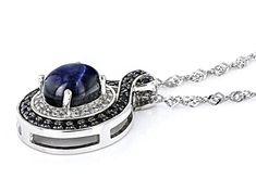 9x7mm Oval Cabochon Star Sapphire With 0.35ctw Round Blue Sapphire And 0.13ctw Round White Topaz Rhodium Over Sterling Silver Pendant With 18" Singapore Chain. Measures Approximately 0.87"L x 0.58"W And 2.5mm Bail. Lobster Claw Clasp With 2" Drop Extender. Silver Sapphire Jewelry With Cabochon, Silver Jewelry With Oval Cabochon Gemstone Accents, Sapphire Jewelry With Silver Cabochon, Silver Oval Necklace With Pave Setting, White Gold Sapphire Jewelry With Oval Cabochon, Silver Sapphire Jewelry With Pave Setting, Oval Cabochon Sapphire Jewelry In White Gold, Silver Cabochon Diamond Gemstones, Spiritual Sapphire Necklace With Round Pendant