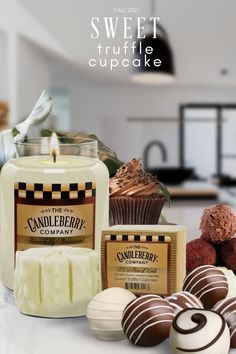 candles, chocolates and candies are sitting on the counter