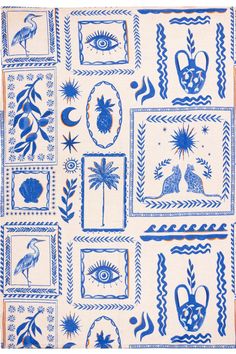 a blue and white cloth with pictures on it, including an all seeing eye design