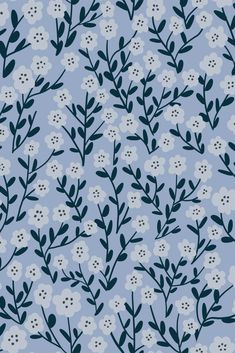 a blue and white flower pattern on a light blue background with small flowers in the center