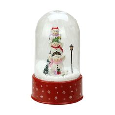 two snowmen under a glass dome on top of a red base