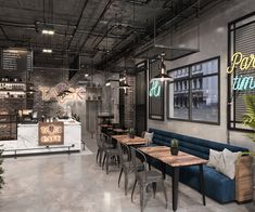 the interior of a restaurant with tables, benches and plants in front of windows that have neon signs on them