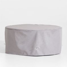 an outdoor table and chair cover on a white background with no one around it,