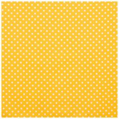 a yellow and white polka dot paper with small white dots on the bottom of it