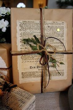 an old book wrapped in twine and tied up with a bow, sitting on a table