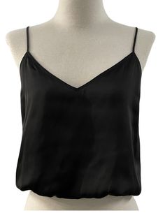 Description Introducing the Amore Love Tank - the must-have tank top for any fashion-forward individual. With its V-neck design and adjustable straps, this bubble tank top offers a versatile and comfortable fit, while the extended length provides coverage and a sleek silhouette. Made with soft, satin material and offering a variety of colors, this tank is perfect for any occasion and a must-have in your closet. Product Details and Fit - V neck- Bubble tank top - Adjustable straps - Regular/loose Trendy V-neck Top With Adjustable Straps, Chic V-neck Top With Straps, Chic Tank Vest With Built-in Bra, V-neck Straps Camisole For Night Out, V-neck Camisole With Straps For Night Out, Chic Solid Camisole Vest, V-neck Tank Top With Delicate Straps For Night Out, Black Summer Camisole With Wide Straps, V-neck Top With Adjustable Straps For Night Out