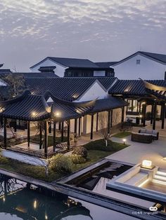 an aerial view of a house at dusk