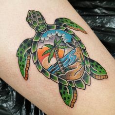 a turtle with a palm tree on it's head is depicted in this colorful tattoo