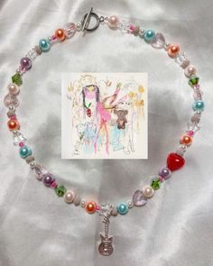 This GORG necklace is inspired by Beabadoobee's new album, Beatopia!! We ❤️ this necklace and hope you do too!! 16in long Message for questions Happy shopping🎀🎀 Rockstar Necklace, Long Message, Diy Collier, Colorful Necklace, Beaded Necklace Designs, Diy Things, Inspired Necklace, Jewelry Accessories Ideas, Homemade Jewelry