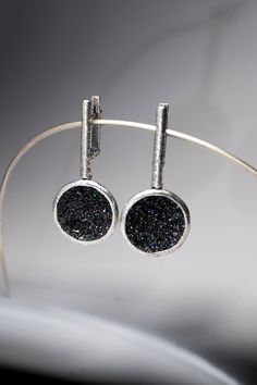 "Long Elegant Earrings Sterling Silver 925 with Raw Druzy Rainbow Carborundum, Set with Ring Armenian Handmade Jewelry, Gift for Her Earrings weight - 12,1 gram Height - 4,4 cm / 1,73 inches Diameter of round part - 2 cm/ 0,79 inches Ring Weight  - 9,5 gram Diameter of round part - 2,3 cm/ 0,9 inches Silver ring with black carborundum, on the surface of which there is an iridescent effect - colored overflows. Carborundum is an amazing \"cosmic\" stone that shimmers with all the colors of the rainbow and beckons with a brilliant shine. Strictly speaking, it is not even a mineral, but an alloy of silica and carbon; it practically does not occur on Earth, and most of the specimens were obtained in laboratory conditions. A small amount of carborundum was found in meteorite debris, and this mat Sterling Silver Jewelry With Lever Back For Party, Sterling Silver Jewelry With Oxidized Finish For Party, Round Design, Elegant Earrings, Sterling Earrings, Unique Rings, Jewelry Set, Sterling Silver Earrings, Silver Earrings