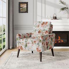 a living room with a floral chair and fireplace