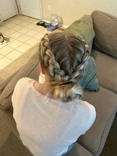 Two dutch braids into low messy bun. Middle part. Blonde, thick hair. Hair Styles Dutch Braid, Double Braid Into Ponytail, 2 Braids Into Messy Bun, Cute Rodeo Hairstyles Long Hair, Dutch Braid Into Messy Bun, Double French Braid Into Bun, French Braid To Space Buns, Tow Braids Into A Ponytail, Braid In Back Of Hair