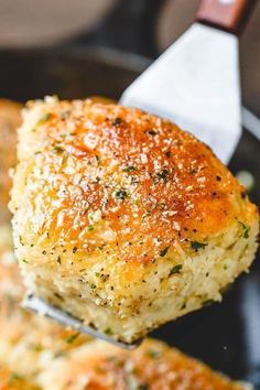 a close up of a piece of food on a spatula