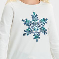 Prepare your kid's wardrobe for the winter season with this Long-Sleeve 'Snowflake' Graphic T-Shirt from Cat & Jack™. Made from cotton-recycled polyester blend material, this long-sleeve tee showcases a print of a blue and green plaid snowflake for a cool look. Tailored in a relaxed fit, this T-shirt features a crew neckline for a classic appeal. Plus, the pullover style makes it easy to wear with jeans, shorts, joggers and more. Cat & Jack™: Designed for all children so you can trust it's made Cute Christmas Shirts Snow Flake, Snowflake Shirt, Winter Holiday Long Sleeve T-shirt, Festive Winter Crew Neck T-shirt, Winter Dog Print Crew Neck Top, Kids Wardrobe, Cat & Jack, Kids Outfits Girls, Fabric Names