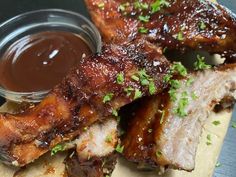 barbecue ribs with bbq sauce on the side