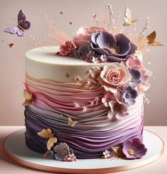 a multi - layered cake with flowers and butterflies on the top is decorated in pastel colors