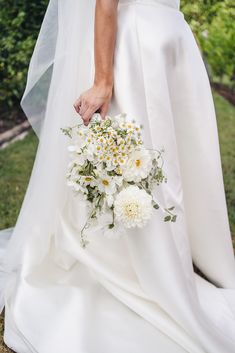 Flower bouquet being held. Small Wedding Bouquets Simple, Non Rose Wedding Bouquet, Dainty Wedding Bouquet, Dainty Floral Bouquet, Simple Elopement Bouquet, Summer Garden Bouquet, Inexpensive Wedding Bouquet, White Wildflowers Wedding, Garden Flower Bridal Bouquet