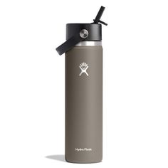 the hydro flask water bottle has a black lid and is shown in front of a white background