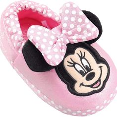 a minnie mouse slipper with a bow on it