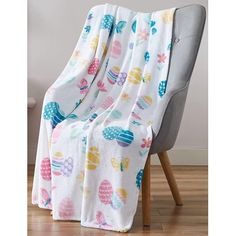 a chair with a blanket on top of it