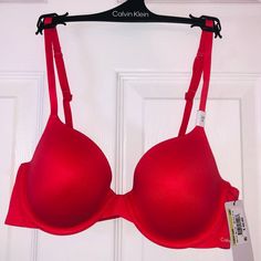 Pretty Reddish Colored Calvin Klein Bra. Size 34b. Lightly Lined (No Padding). Full Coverage With Memory Touch. Adjustable Straps. Clasp In Back. New With Tags. Calvin Klein Bralette, Calvin Klein Ck One, Calvin Klein Bra, Lace Halter Bralette, Padded Bralette, Blue Bra, Nude Bra, Calvin Klein Red, Padded Sports Bra