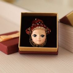 The size of this brooch is 50 mm* 30 mm. To make it, I used a metal clasp,   a leather base, beads, lace and doll face made of Paper Clay and painted   with acrylics. Packed in a beautiful gift box. Unique Enamel Pin Gift, Vintage Brown Brooches For Gifts, Vintage Handmade Brooches For Gifts, Brown Brooch Jewelry Gift, Brown Jewelry Brooch For Gifts, Vintage Handmade Enamel Pin Gift, Havdalah Candle, Cute Mothers Day Gifts, Candle Carving