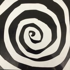 a black and white spiral design is shown