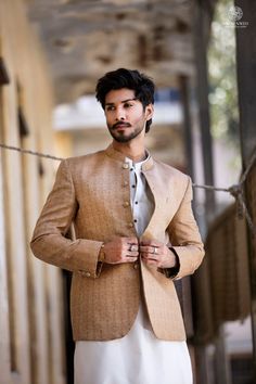 Welcome to Shiraz Saeed Our Retail Store: Rubina's Collection 2070 W Spring creek Pkwy Suite 328 Plano,TX USA 75023 Presenting Men's Beige Jamawar Banarsi Fabric Prince Coat (Kindly provide your size upon checkout) Color: Beige Premium Jamawar Banarsi Fabric Italian Thread Simple & Decent Metal Buttons Finest Stitch Branded Design Custom Sizes are also available. Fit Type: Regular fit Wash Care Instructions: Dry Clean Only Suitable For India Wedding, Festivals And Social Gatherings Disclaimer Due to the photographic lighting & different screen calibrations, the colors of the original product may slightly vary from the picture. Banarsi Fabric, Prince Coat, India Wedding, Shiraz, Social Gathering, Retail Store, Metal Buttons, Custom Sizing, Bespoke