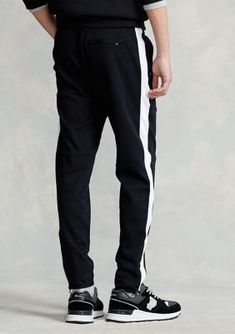 With soft cotton and vented zip hems, these sporty pants are built to keep you comfortable during workouts or weekend jaunts. | Polo Ralph Lauren Men's Soft Cotton Active Pant, Black, X-Large Functional Black Cotton Sweatpants, Sporty Cotton Sports Pants, Sporty Cotton Pants For Sports, Tapered Leg Cotton Sports Pants, Cotton Tapered Leg Sports Pants, Cotton Cargo Pants For Sports, Cotton Tapered Leg Sports Bottoms, Tapered Leg Cotton Bottoms For Sports, Cotton Tapered Leg Gym Bottoms