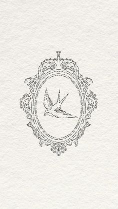 an ornate frame with a bird on it