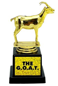 a golden goat trophy sitting on top of a black base with the words, the goat