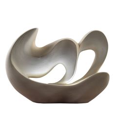 an abstract sculpture is shown against a white background