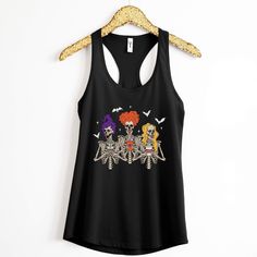 Witchy Tank Top | Halloween Witches  Racerback Tank Top Details   *PLEASE READ*  * SIZING*  - This is a slim fit, fitted tank top, if you would prefer a looser style, we recommend sizing up one or two sizes.  - Can run smaller than usual (especially if you have a larger chest).  - Refer to sizing chart in images to determine the correct size.  - TIP: measure one your existing tank tops to gauge which size would fit best. * 60% combed ringspun cotton, 40% polyester * Pre-Shrunk  * Machine Washable  Care Instructions *PLEASE READ*  * Cold machine wash only on a gentle cycle with similar colours - wash garment inside out  * Use standard washing powder only; it is not recommended that fabric softeners be used as they may strip the coloured ink * If ironing is necessary, iron inside-out on the Punk Halloween Party Tank Top, Punk Style Halloween Party Tank Top, Punk Black Tank Top For Halloween, Punk Style Black Tank Top For Halloween, Witchy Clothing, Halloween Clothes, Halloween Apparel, Outfit Retro, Halloween Top