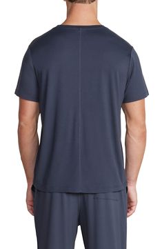 Lightweight and exceptionally soft, this stretchy T-shirt makes a great choice for the gym, a relaxing afternoon or a night of sweet, sweet slumber. Crewneck Short sleeves 91% polyester, 9% spandex Machine wash, tumble dry Imported Stretch Jersey Sports Tops, Summer Lounging T-shirt With Short Sleeves, Casual Soft-washed Tops For Lounging, Relaxed Short Sleeve T-shirt For Relaxation, Moisture-wicking Athleisure Top For Loungewear, Short Sleeve Athleisure Tops For Relaxation, Athleisure Moisture-wicking Lounge Top, Comfortable Short Sleeve Tops, Cotton Crew Neck T-shirt For Lounging